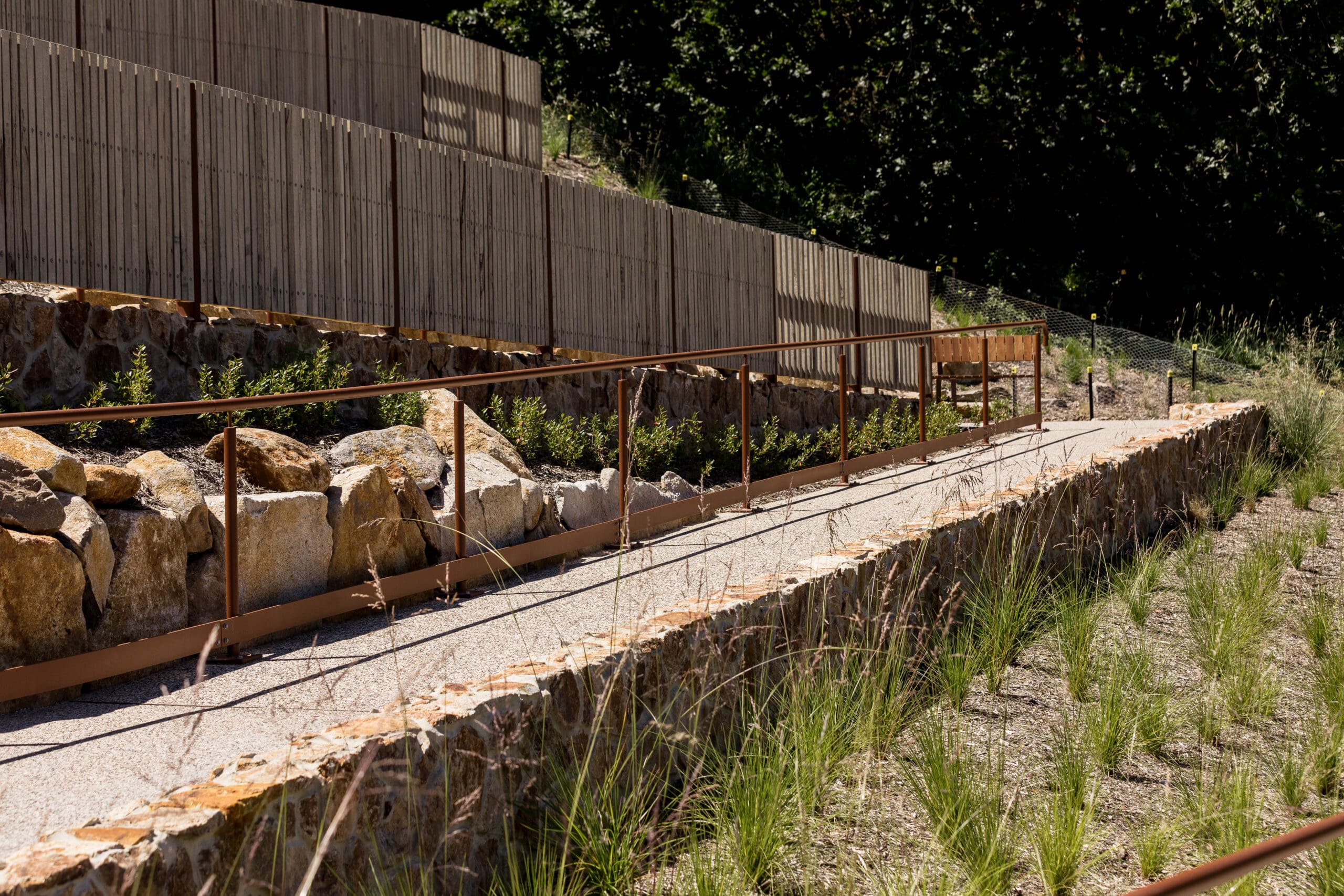 A DDA compliant path makes enjoying ngurrak barring artwork more accessible.